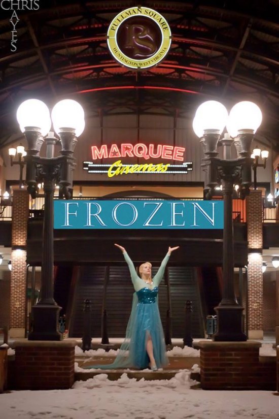 Cinedign , Wizard World Launching Comic Con Channel Profession cos play model, Elsa Littlepage as Frozen's "Elsa" outside Marquee Pullman Square, a fully digital 16 screen stadium theater in Huntington, WV